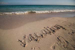 Vacances écrites sur la photo de plage