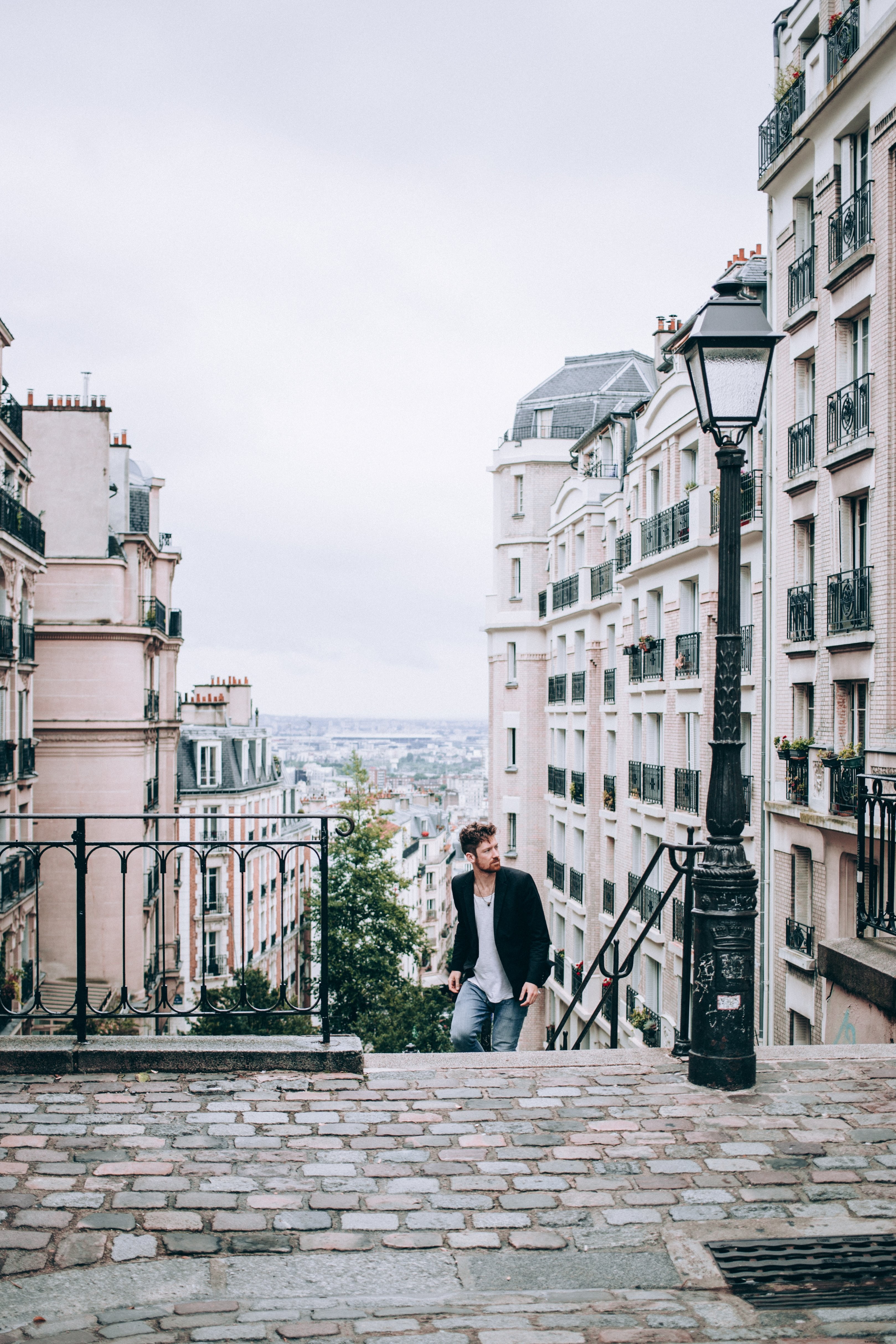 Mens Fashion Climbing Steps To Cobbled Street Photo