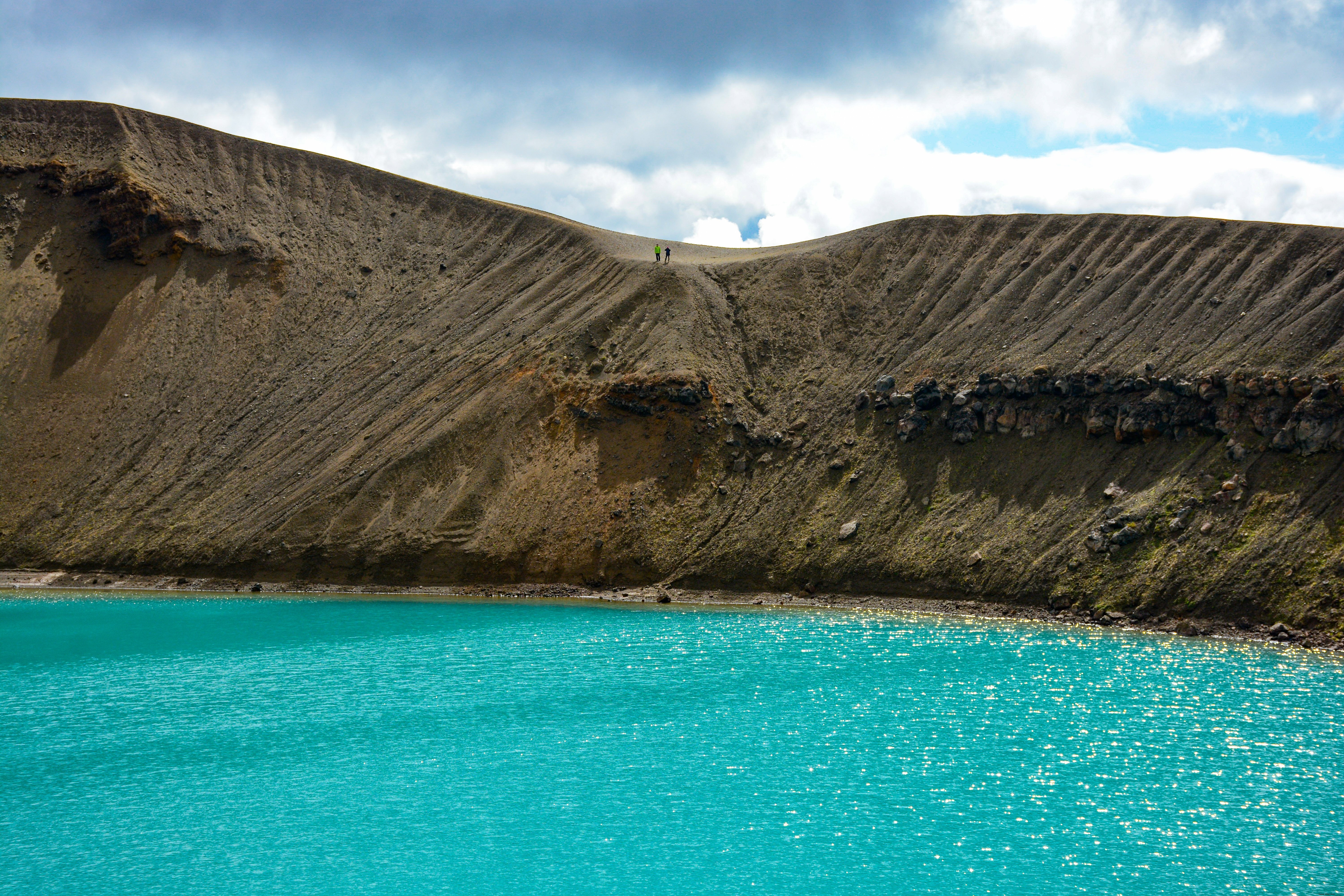 Blue Glacier Waters By Hills Foto