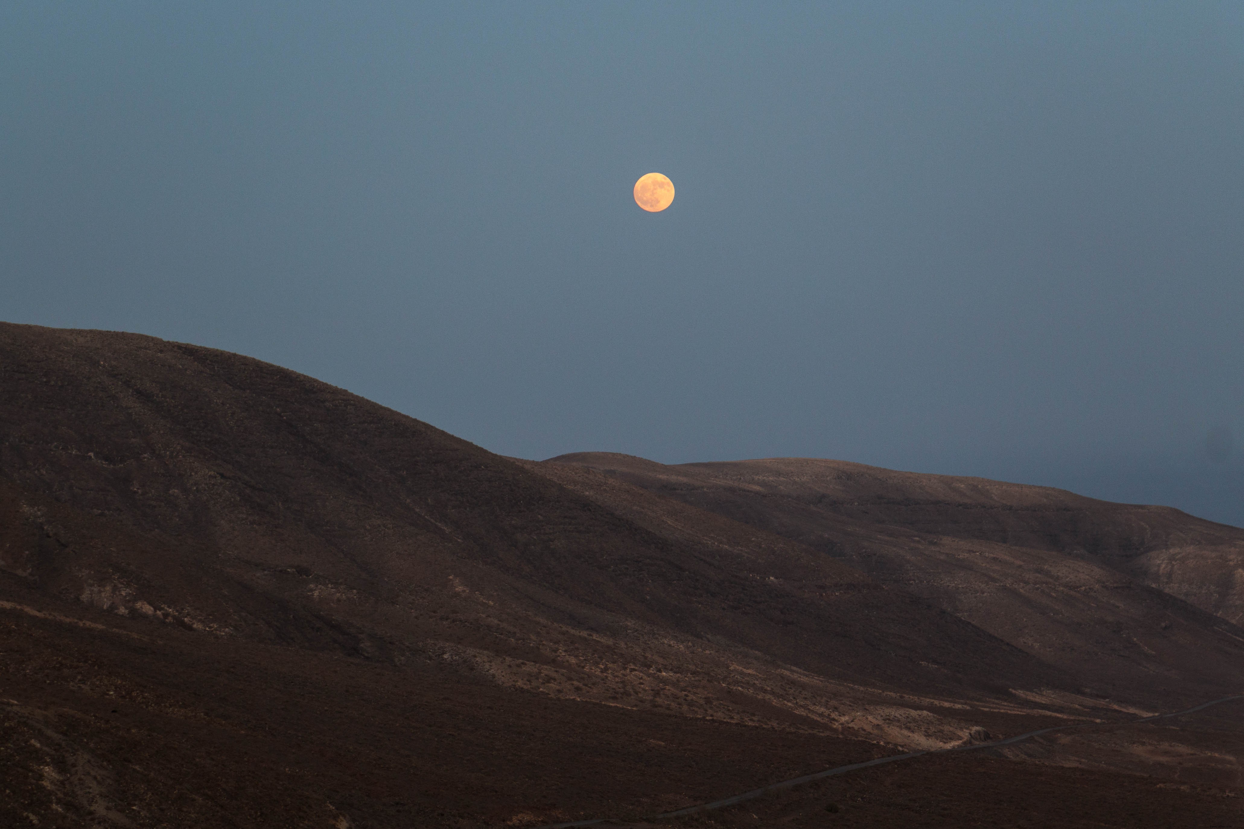 Full Harvest Moon Over Spanish Hillside Photo