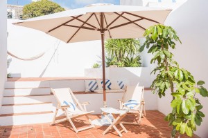 Matahari, Pasir, dan Hotel Butik yang Indah di Pantai Portugis 