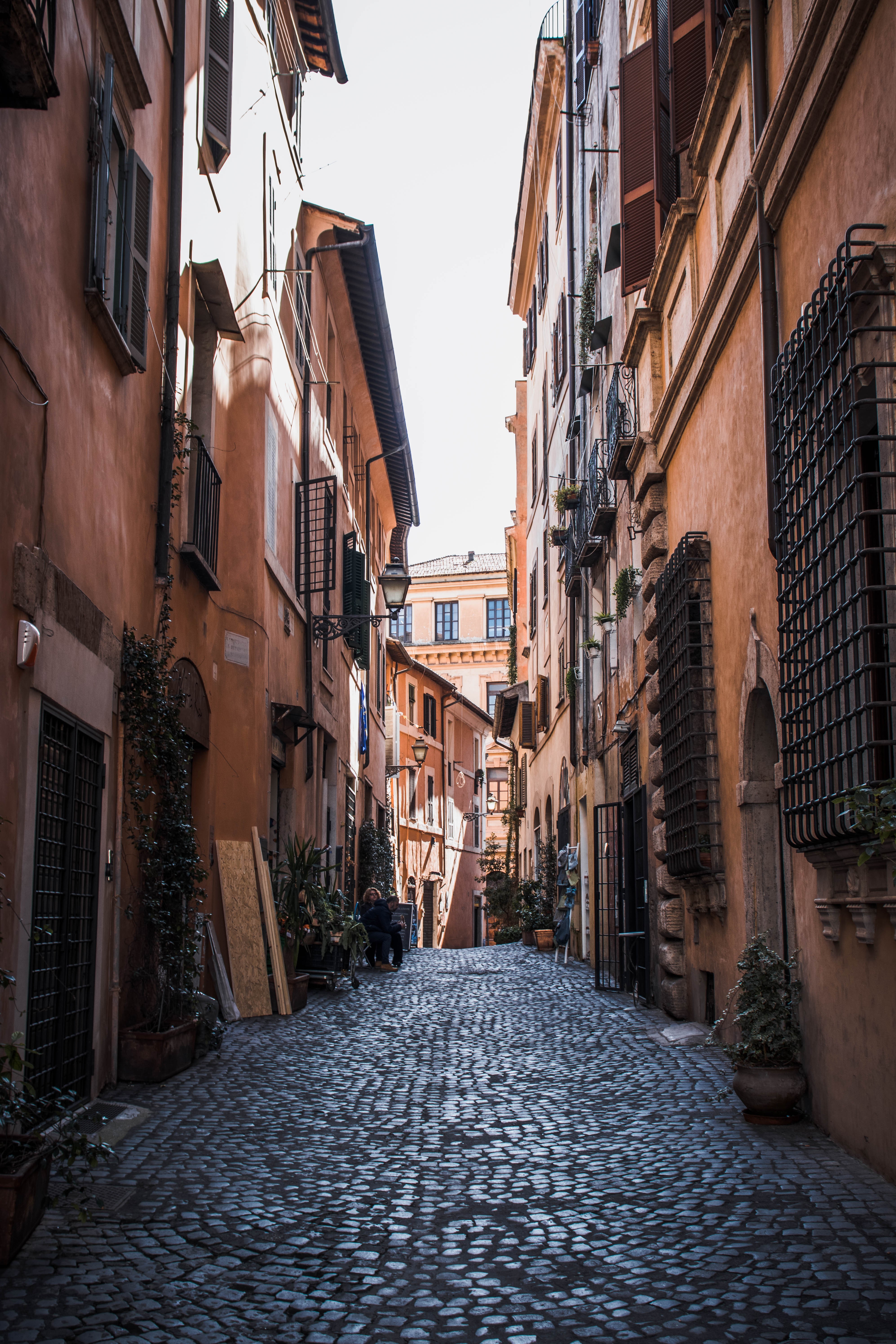 Orange Buildings Line A Cobblestone Street Photo 