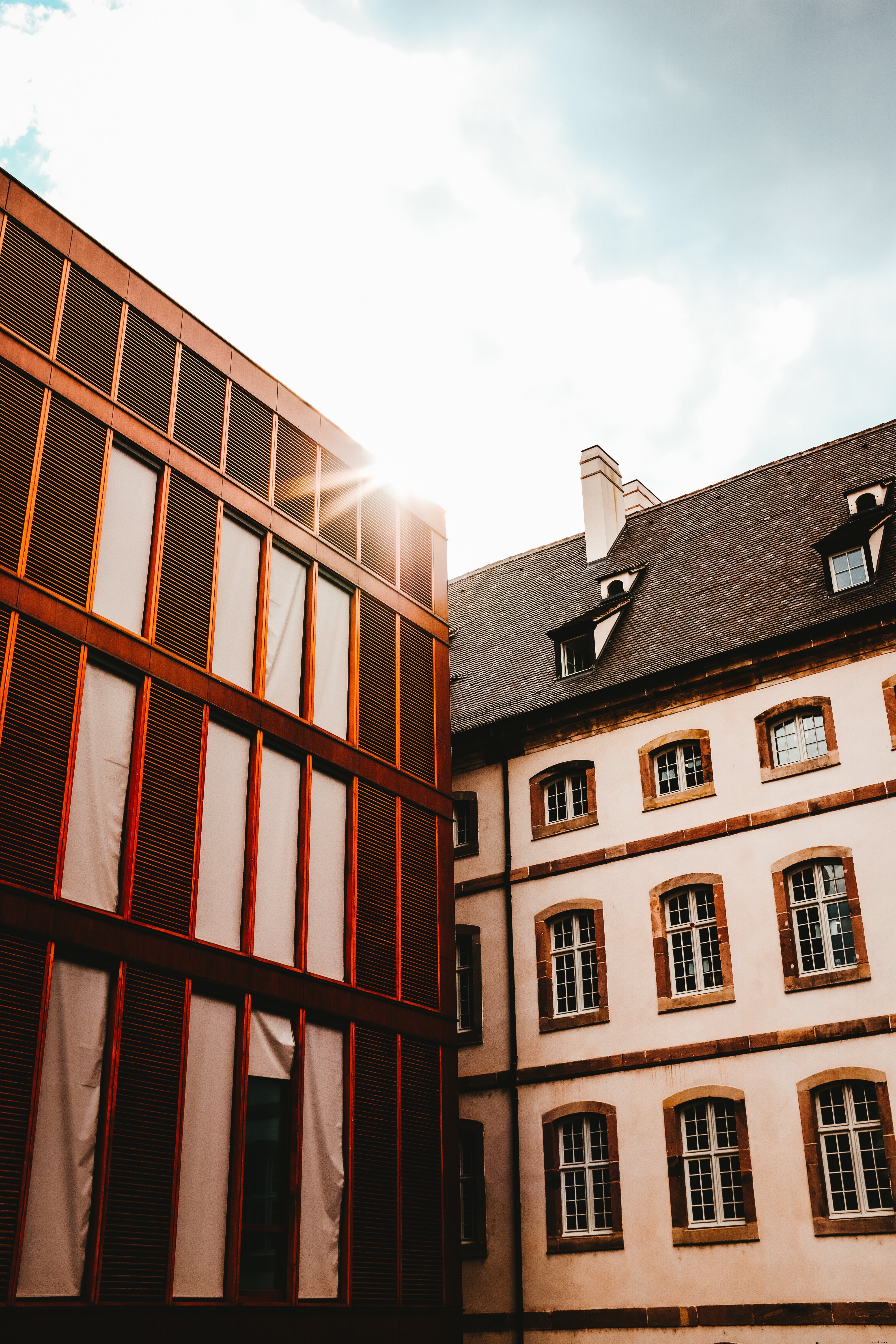 Glimmer Of Sunilght Over Buildings Photo 